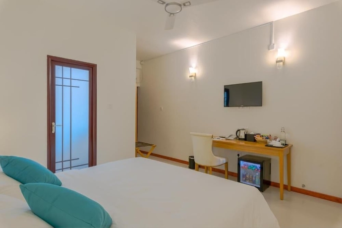 Imagen de la habitación del Hotel White Sand Dhigurah. Foto 18