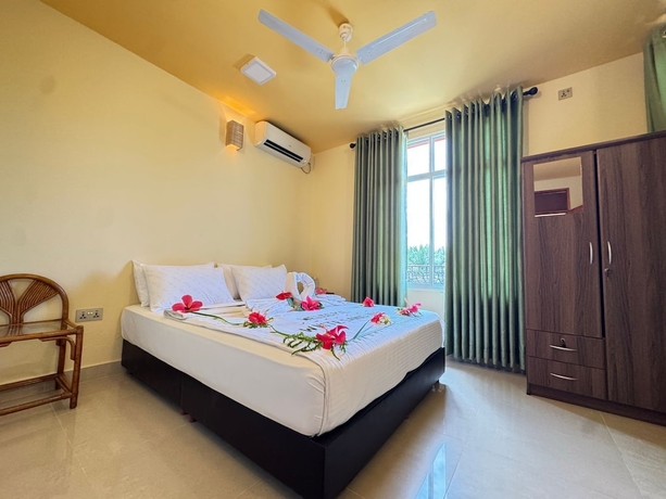 Imagen de la habitación del Hotel White Sand Inn. Foto 3
