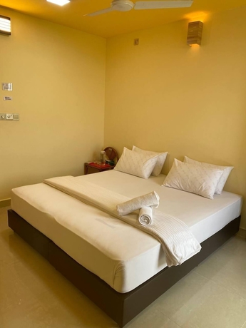Imagen de la habitación del Hotel White Sand Inn. Foto 8