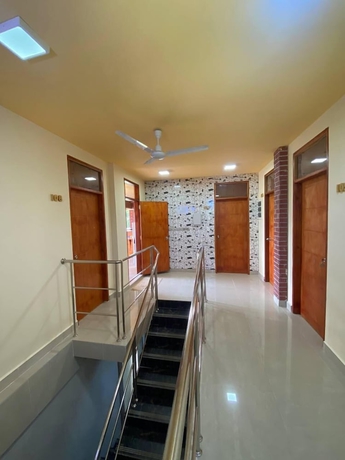Imagen de la habitación del Hotel White Sand Inn. Foto 11
