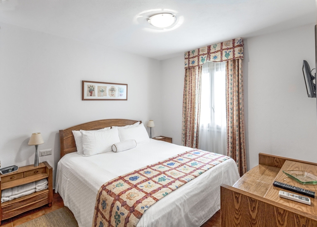 Imagen de la habitación del Hotel White Sands Beach Club. Foto 9