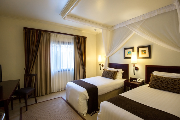 Imagen de la habitación del Hotel White Sands Resort and Conference Centre. Foto 4