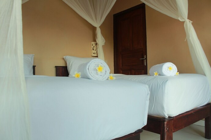 Imagen de la habitación del Hotel White Sandy Beach Menjangan. Foto 30