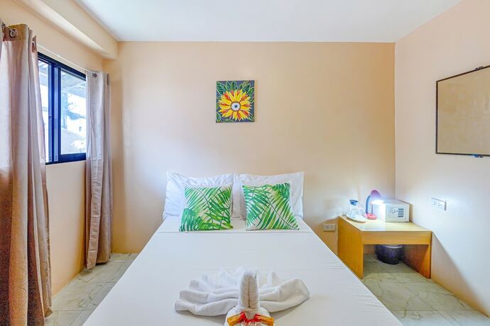 Imagen de la habitación del Hotel White Shamrock Beach. Foto 17