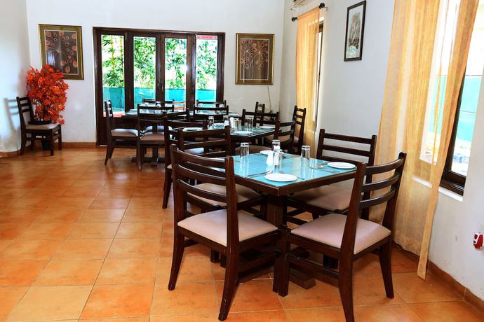 Imagen del bar/restaurante del Hotel White Square Nirvana, Parra. Foto 4