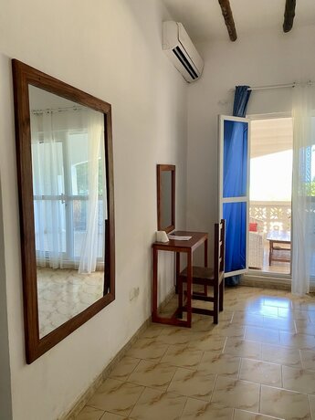 Imagen de la habitación del Hotel White Star Ocean View. Foto 16