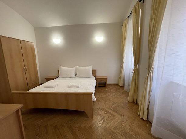 Imagen de la habitación del Hotel White Swan Boutique Apartments. Foto 2