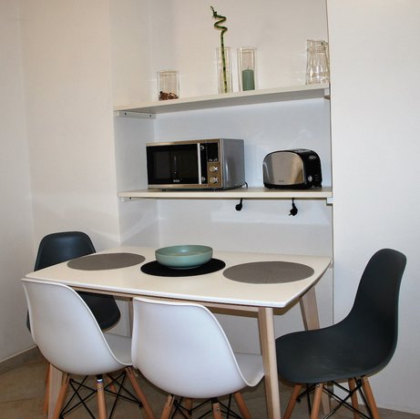 Imagen de la habitación del Hotel White Swan Boutique Apartments. Foto 3