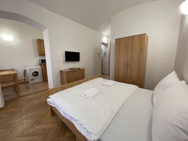 Imagen de la habitación del Hotel White Swan Boutique Apartments. Foto 4