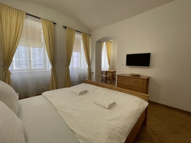 Imagen de la habitación del Hotel White Swan Boutique Apartments. Foto 8