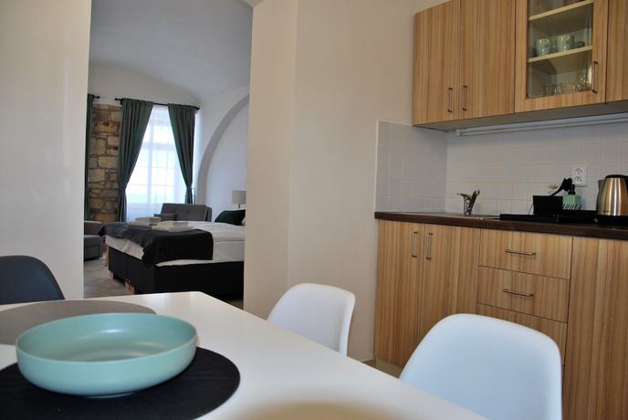 Imagen de la habitación del Hotel White Swan Boutique Apartments. Foto 10