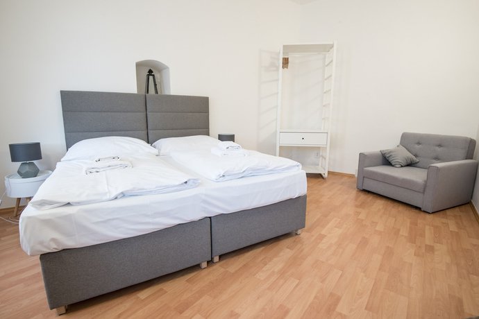 Imagen de la habitación del Hotel White Swan Boutique Apartments. Foto 11