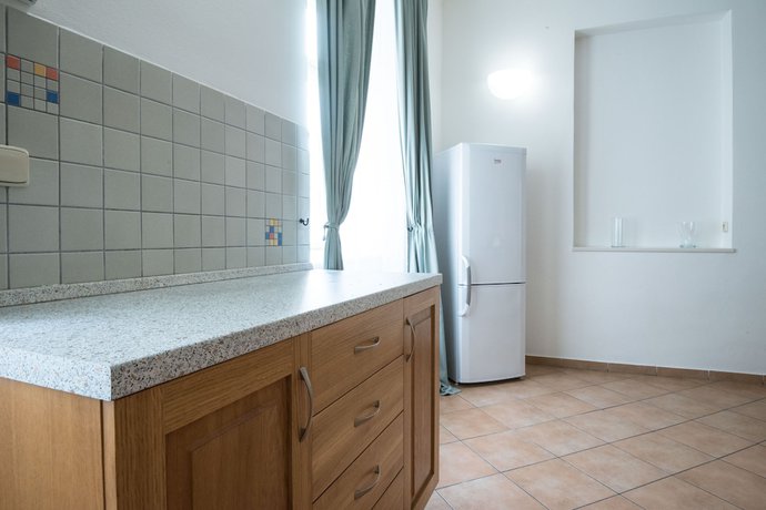 Imagen de la habitación del Hotel White Swan Boutique Apartments. Foto 12