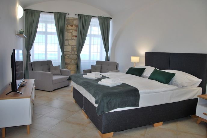 Imagen de la habitación del Hotel White Swan Boutique Apartments. Foto 16
