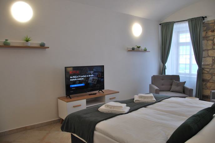 Imagen de la habitación del Hotel White Swan Boutique Apartments. Foto 17
