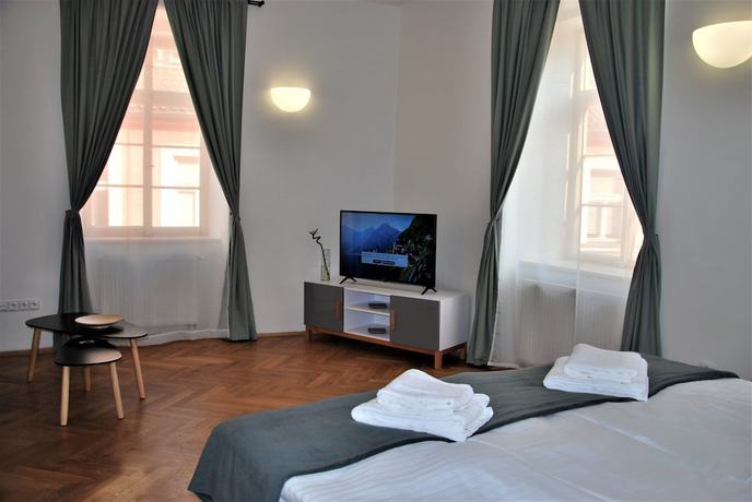 Imagen de la habitación del Hotel White Swan Boutique Apartments. Foto 18