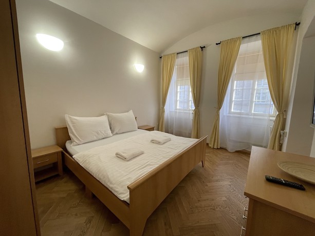 Imagen de la habitación del Hotel White Swan Boutique Apartments. Foto 19