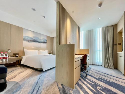 Imagen de la habitación del Hotel White Swan VYV, Foshan. Foto 15