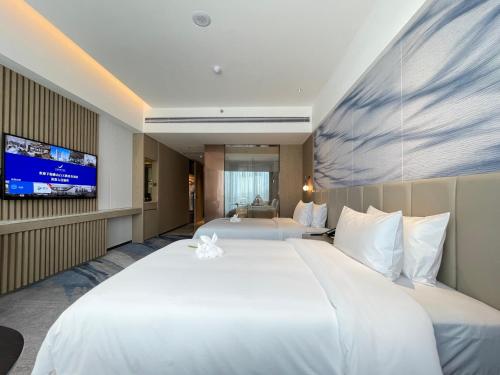 Imagen de la habitación del Hotel White Swan VYV, Foshan. Foto 16