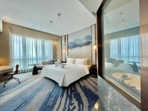 Imagen de la habitación del Hotel White Swan VYV, Foshan. Foto 19