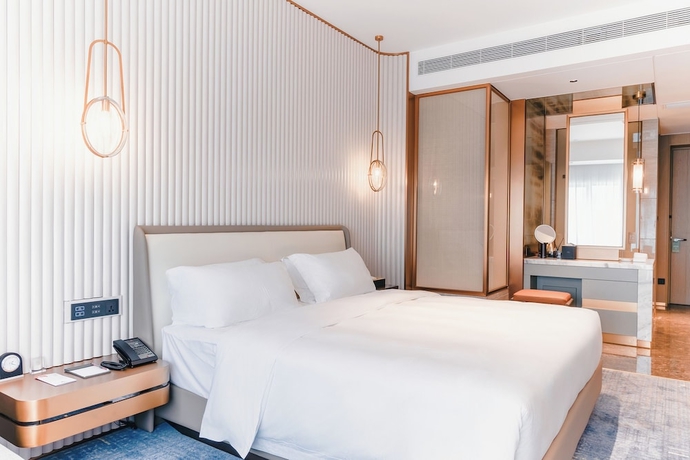 Imagen de la habitación del Hotel White Swan Zhangjiang. Foto 2