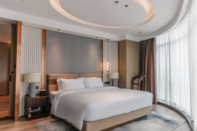 Imagen de la habitación del Hotel White Swan Zhangjiang. Foto 4