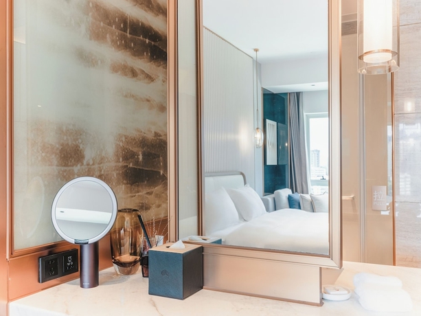 Imagen de la habitación del Hotel White Swan Zhangjiang. Foto 12