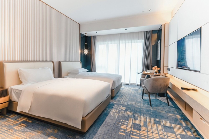 Imagen de la habitación del Hotel White Swan Zhangjiang. Foto 14