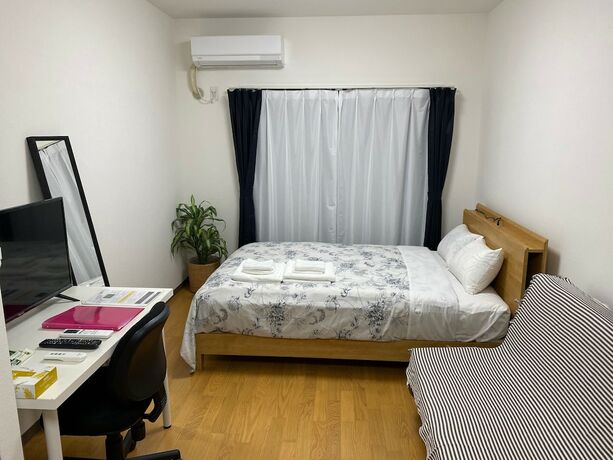 Imagen de la habitación del Hotel White Terrace Sakurashinmachi. Foto 15