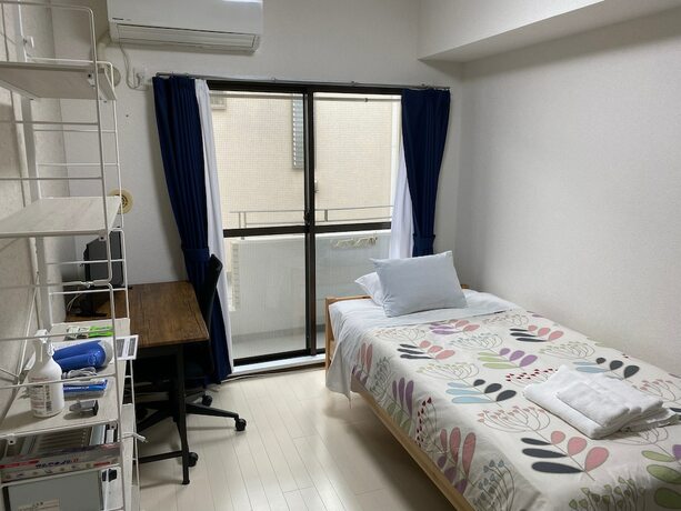 Imagen de la habitación del Hotel White Terrace Sakurashinmachi. Foto 19