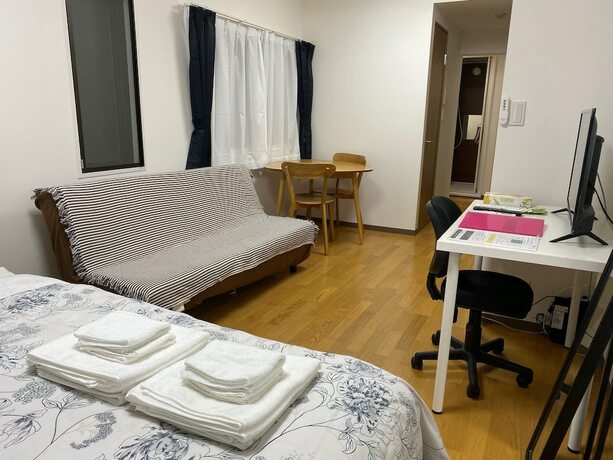 Imagen de la habitación del Hotel White Terrace Sakurashinmachi. Foto 20
