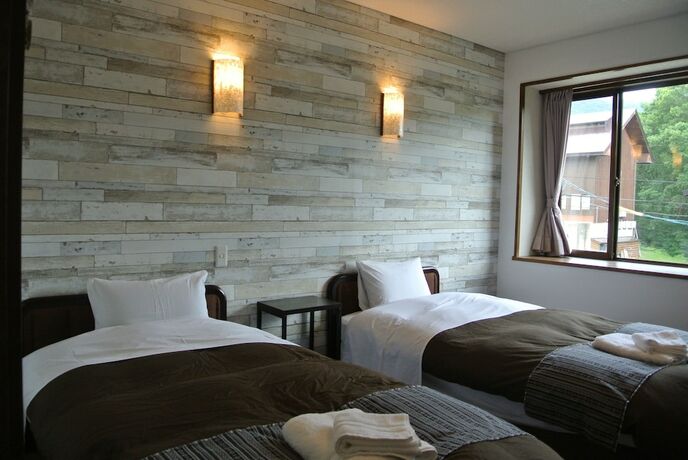 Imagen de la habitación del Hotel White Tree Lodge. Foto 17