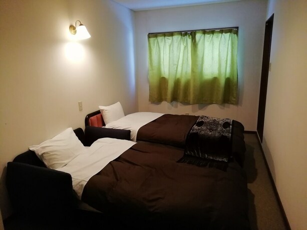 Imagen de la habitación del Hotel White Tree Lodge. Foto 21