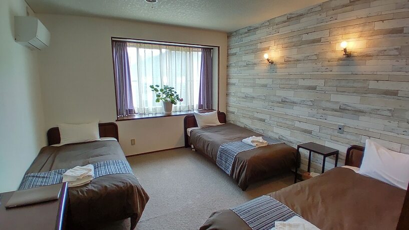 Imagen de la habitación del Hotel White Tree Lodge. Foto 23
