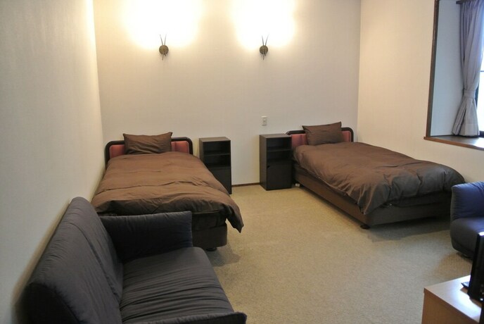 Imagen de la habitación del Hotel White Tree Lodge. Foto 24