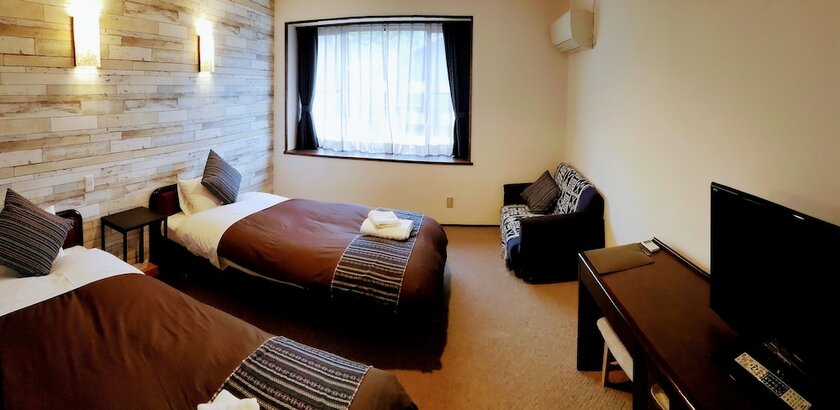 Imagen de la habitación del Hotel White Tree Lodge. Foto 29