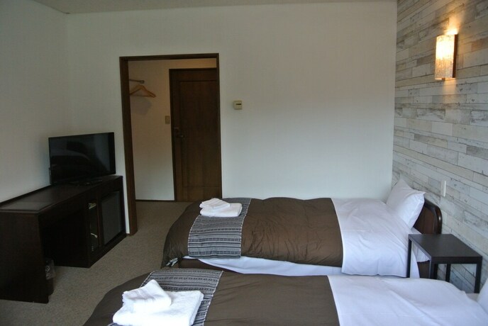 Imagen de la habitación del Hotel White Tree Lodge. Foto 31