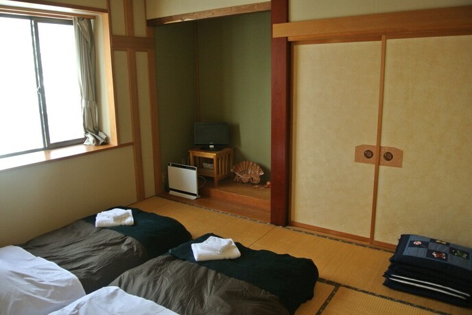 Imagen de la habitación del Hotel White Tree Lodge. Foto 33