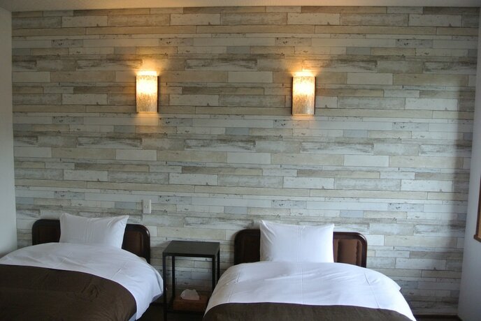 Imagen de la habitación del Hotel White Tree Lodge. Foto 35