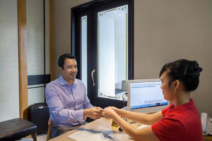 Imagen de los interiores del Hotel White Tree Residence. Foto 8