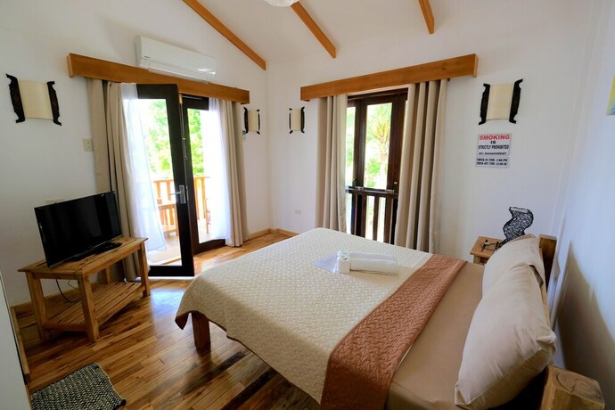 Imagen de la habitación del Hotel White Villas Resort. Foto 22