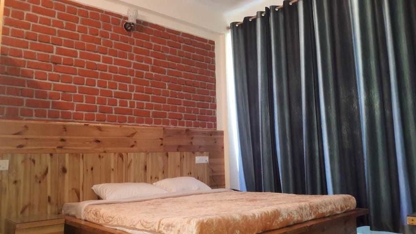 Imagen de la habitación del Hotel White Water Inn McLeodganj. Foto 11