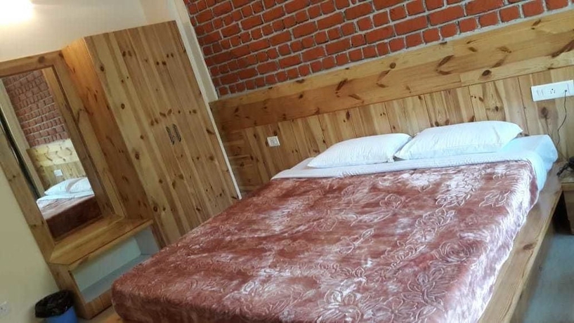Imagen de la habitación del Hotel White Water Inn McLeodganj. Foto 12