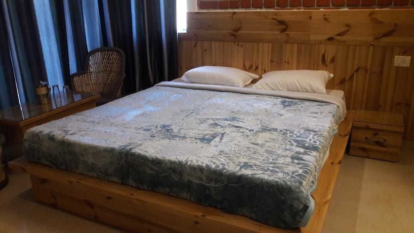 Imagen de la habitación del Hotel White Water Inn McLeodganj. Foto 14