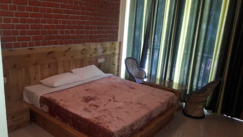 Imagen de la habitación del Hotel White Water Inn McLeodganj. Foto 15