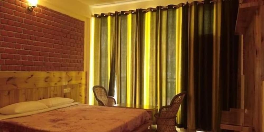 Imagen de la habitación del Hotel White Water Inn McLeodganj. Foto 16