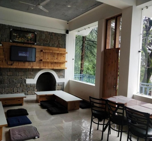 Imagen del bar/restaurante del Hotel White Water Inn McLeodganj. Foto 2
