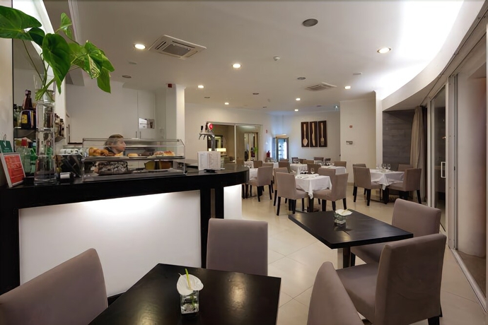 Imagen del bar/restaurante del Hotel White Waters. Foto 6