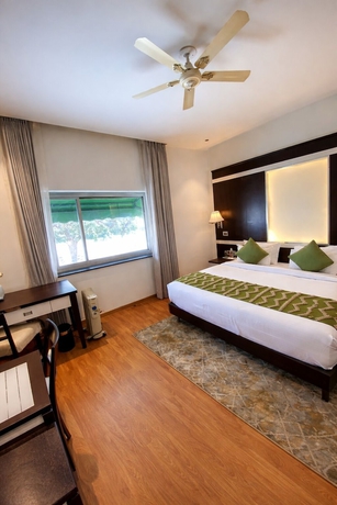 Imagen de la habitación del Hotel White Wharf Manesar. Foto 2