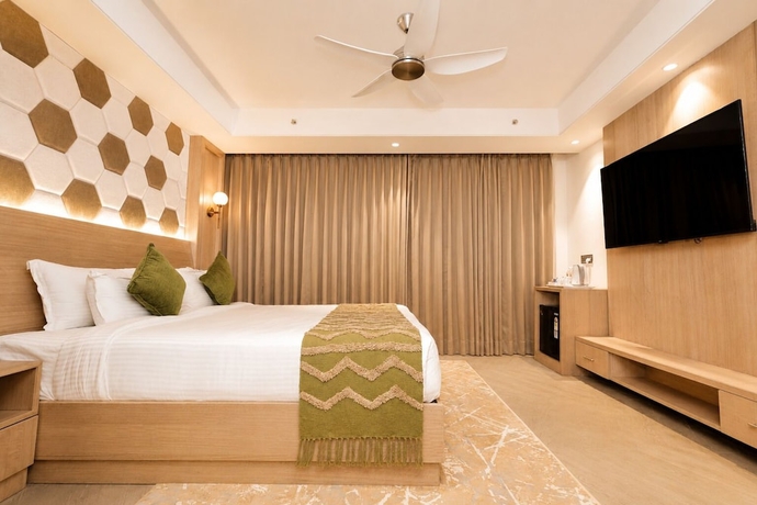 Imagen de la habitación del Hotel White Wharf Manesar. Foto 3